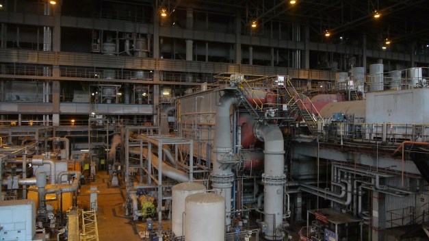 Huge red machines the size of a cathedral to generate power